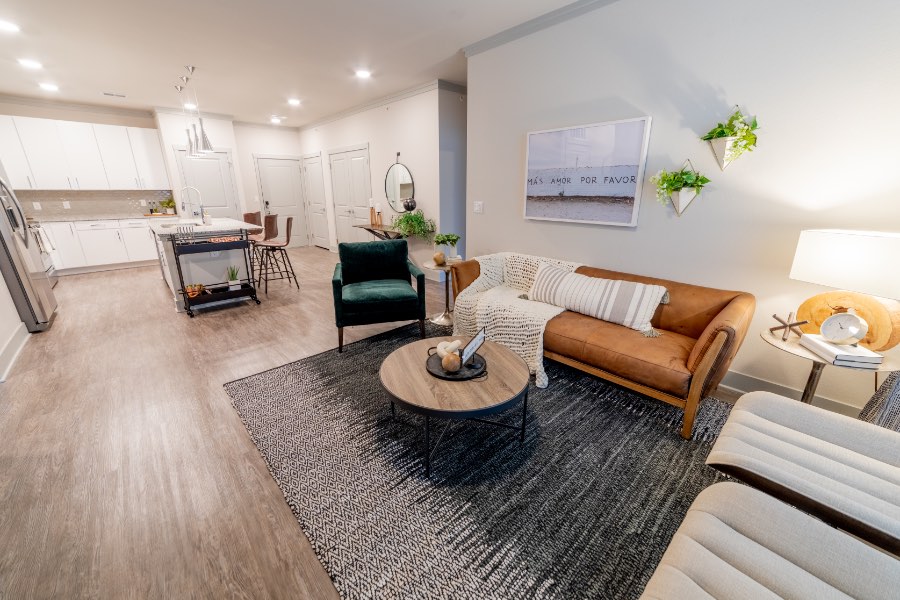 Open apartment floor plan with connected kitchen and living room.